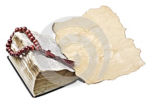 Bible with rosary and old paper