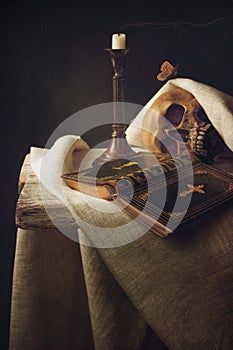 Bible, Skull, Candle as Symbol for Life, Death and Resurrection