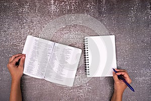 Bible Study and notebook on a Old texture Table. Copy space text. Christian concept