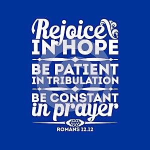 Bible typographic. Rejoice in hope, be patient in tribulation, be constant in prayer. photo