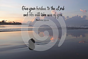 Bible verse inspirational quote - Give your burdens to the Lord and He will take care of you. Psalms 55:22 On blue beach view. photo