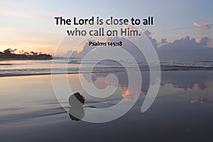 Bible verse inspirational quote - The Lord close to all who call on Him. Psalms 145:18 on tranquil beach background at sunrise. photo