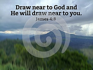 Bible verse quote - Draw near to God and He will draw near to you. James 4:8 on mountain background with dramatic sky clouds.