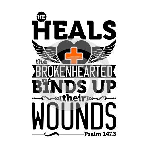 Biblical illustration. He heals the brokenhearted and binds up their wounds photo