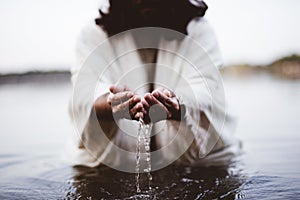 Biblical scene - of Jesus Christ drinking water with his hands