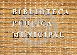 Biblioteca publica municipal sign. City public library in spanish photo