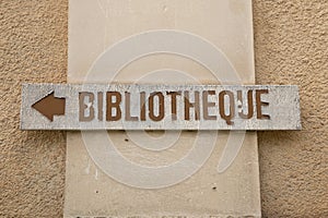 Bibliotheque sign french text on facade means library on Village Building Municipal bookcase in city center