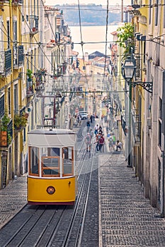 The Bica Funicular Elevador or Ascensor da Bica is a famous tourist attraction in Chiado District. Sunny day in summer. Travel