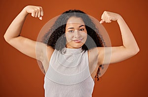 Bicep, flex and portrait of strong woman in studio isolated on background for girl power. Arms, attitude and confidence