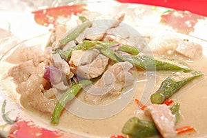 Bicol express meal with meat, beans, sauce, and chili on plate serve in the eatery in Philippines