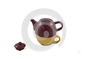 Bicolor ceramic teapot on white background. photo