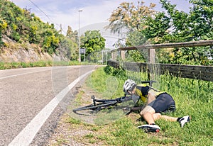 Bicycle accident on the road - Biker in troubles