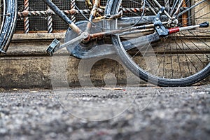 Bicycle against a rustic wall