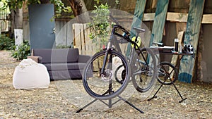 Bicycle awaiting restoration in yard