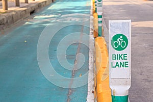 Bicycle or bike lane sign at street or road.