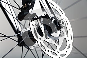 Bicycle brake rotor with hydraulic caliper. Brake system on a gravel bike