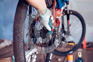 Bicycle care, Mechanic is fixing mountain bike