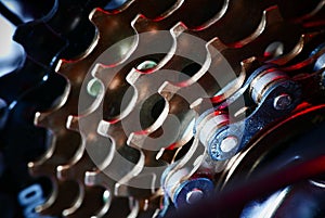 Bicycle chain background with red light