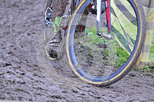 Bicycle chain with mud in a race