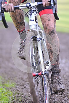 Bicycle chain with mud in a race