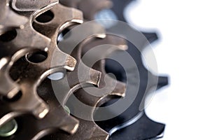 Bicycle chain speed star for changing gears in closeup. On a white background.