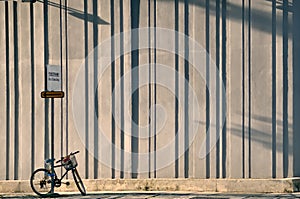 Bicycle chained to street sign photo