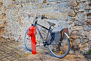 Bicycle on cobblestone street in the old town.