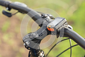 Bicycle computer mounted on a bicycle handlebar