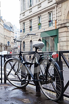 Bicycle covered with snow in a freezing winter day