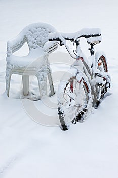 Bicycle covered in snow