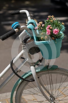 a bicycle with a decorative flower basket