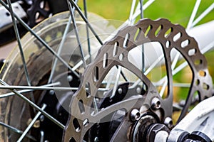 Bicycle disk brake rotor in focus close up