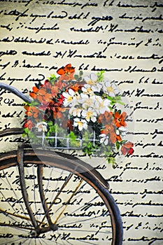 Bicycle with Flowers and Cursive Handwriting