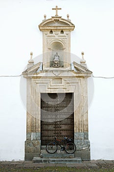 The bicycle in front of old door