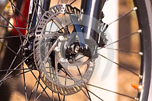 Bicycle front wheel close up. Preparing to ride. Rear sprocket on bike
