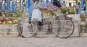 Bicycle at a graveyard in Romania