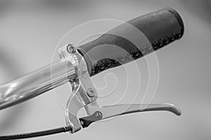 Bicycle handle bar and retro filter. Black and white image with