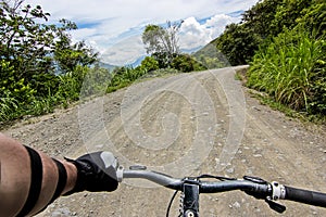 Bicycle handle bar on Yungas road / POV