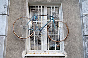 Bicycle hanging on the window