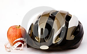 Bicycle helmet and apple