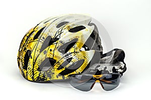 Bicycle helmet, glasses and cycle gloves