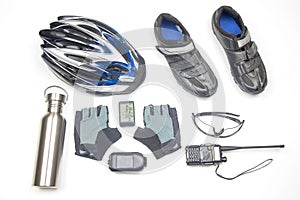 Bicycle helmet, glasses, gloves, bottle, walkie-talkie, camera and cycling shoes on a white background