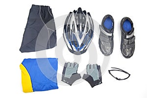 Bicycle helmet, glasses, gloves, sportswear and cycling shoes on a white background