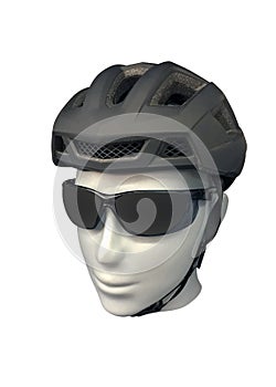 Bicycle helmet with glasses on a mannequin isolated on white background