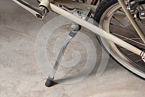 A bicycle kickstand center mounts a close-up view.