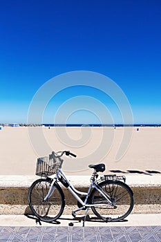 Bicycle in La Malvarrosa beach, Valencia, Spain photo