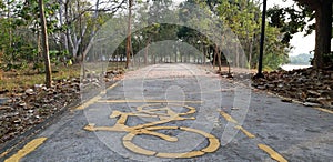 Bicycle lane. Bicycle path in the park, road is a thoroughfare, Road bicycler
