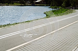 Bicycle lane for exercise surround with along reservoir/bicycle