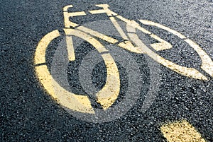 Bicycle lane sign on road