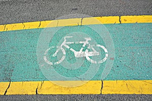 Bicycle lane sign on road